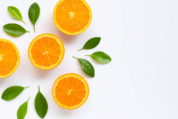 istock Fresh orange citrus fruit with leaves isolated on white background. 1159102928