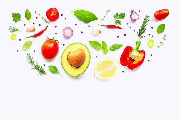 istock Various fresh vegetables and herbs on white background. Healthy eating concept 1159102934