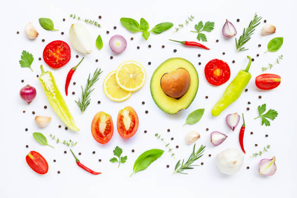 istock Various fresh vegetables and herbs on white background. Healthy eating concept 1159103669