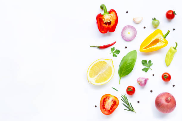 istock Various fresh vegetables and herbs on white. Healthy eating concept 1159105515