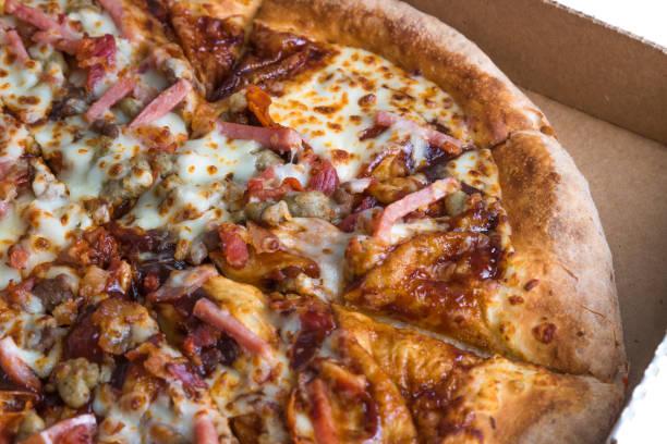istock Delivery barbeque pizza  in the box. Close up view. 1159111116