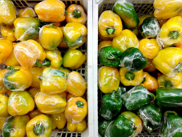 istock yellow and green papricas or bell peppers 1159111641