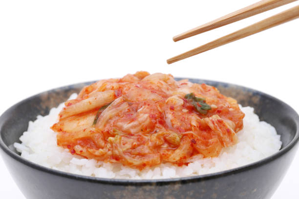 istock Korean food, kimchi on white rice 1159112613