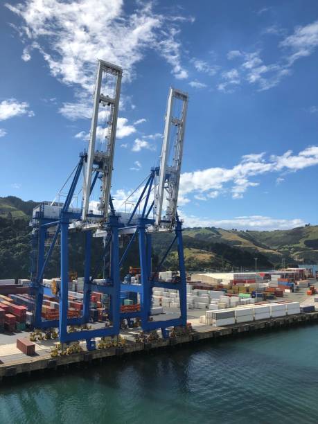 istock Shipping containers against a blue sky 1159116189