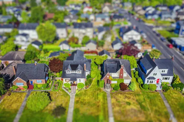 Aerial photo of a quaint American suburban neighborhood with tilt-shift lens effect applied