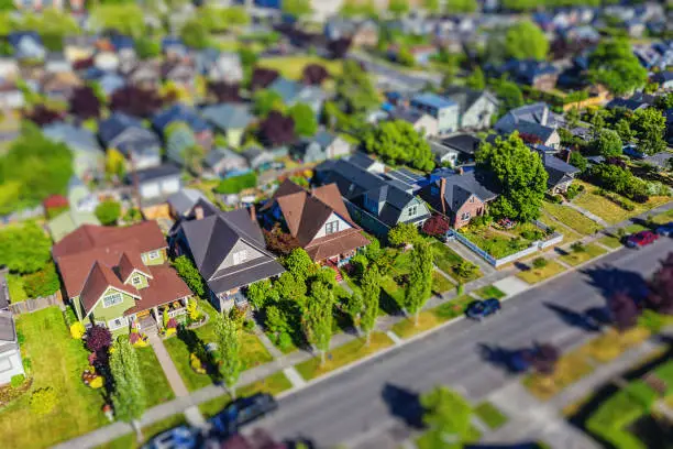 Aerial photo of a quaint American suburban neighborhood with tilt-shift lens effect applied