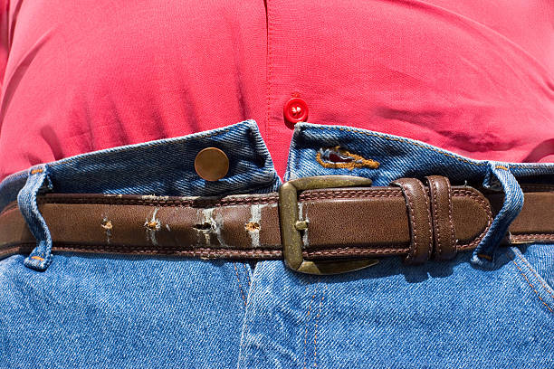 ceinture dernier trou - belly button photos et images de collection