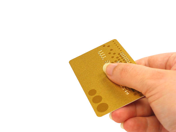 Hand holding credit card (clipping path included) stock photo