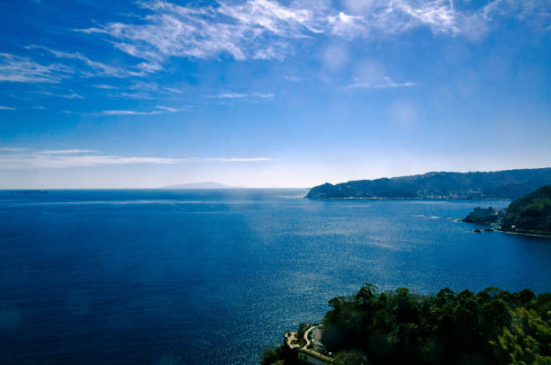 Izu coastline can be seen. Dark sea.