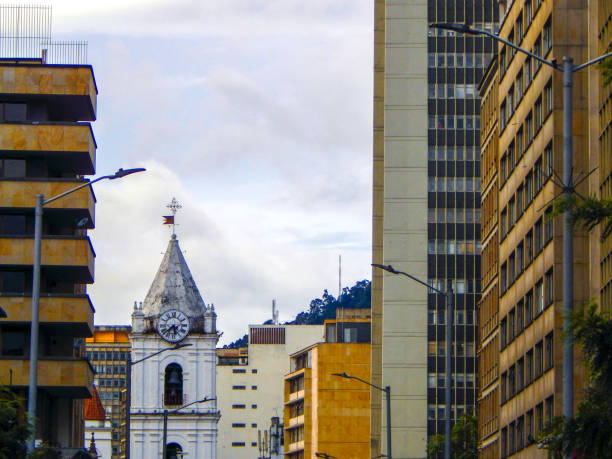 istock Buildings and a church on a cloudy day (Carrera Septima in Bogota) 1159120984