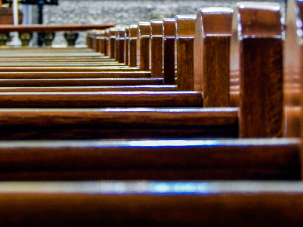 istock Row of benches in a Catholic cathedral (Catedral primada de Bogota) 1159121021