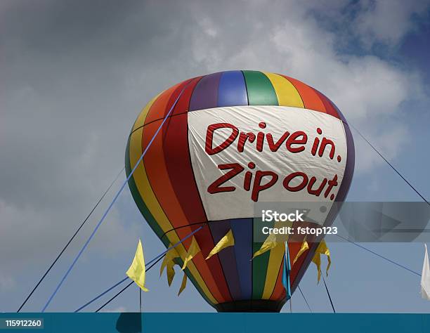 Grand Opening Balloon On Building Top Drivein Zip Out Colorful Stock Photo - Download Image Now