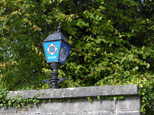 Garda sign outside station in Ennis Co. Clare Ireland Irish police lamp or Garda sign outside the station in Ennis Co. Clare Ireland. county clare stock pictures, royalty-free photos & images