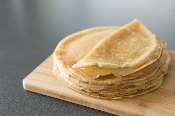 Thin homemade pancakes with crispy crust. Maslenitsa holiday.