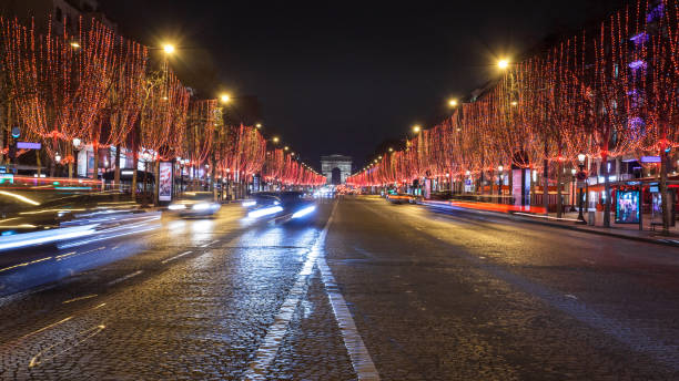 istock Avenue des Champs Elysees and Arc de Triomphe at night, Paris 1159133373