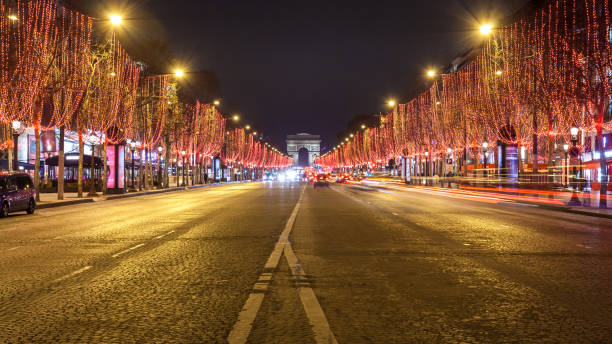 istock Avenue des Champs Elysees and Arc de Triomphe at night, Paris 1159133385