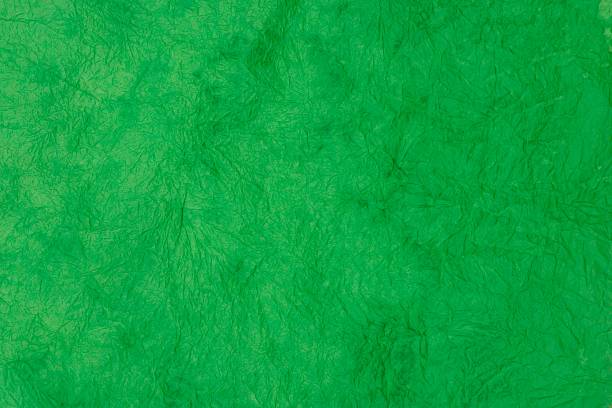 Crinkled textured Green Background stock photo