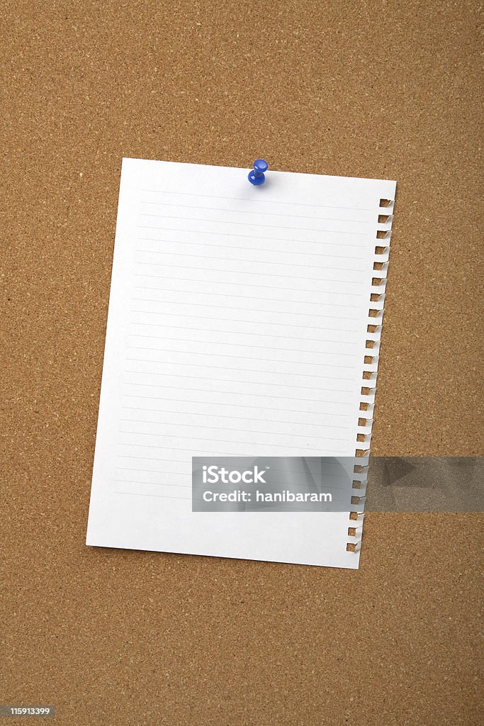 Cork board with blank sheet Attached Stock Photo