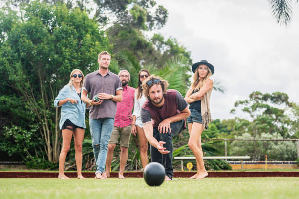 istock Australian Friends Enjoy Playing Lawn Bowling 1159138441