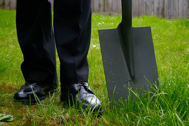 Business man with a spade stock photo