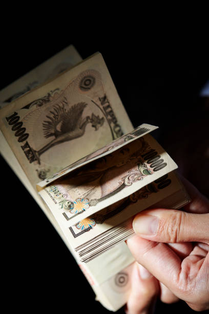 istock Japanese yen banknotes 1159143731