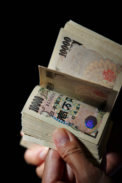 istock Japanese yen banknotes 1159144011