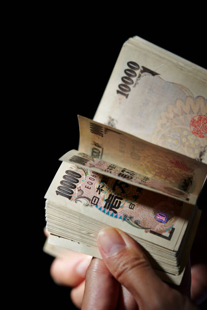 istock Japanese yen banknotes 1159144020