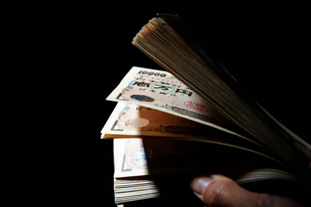 istock Japanese yen banknotes 1159144023