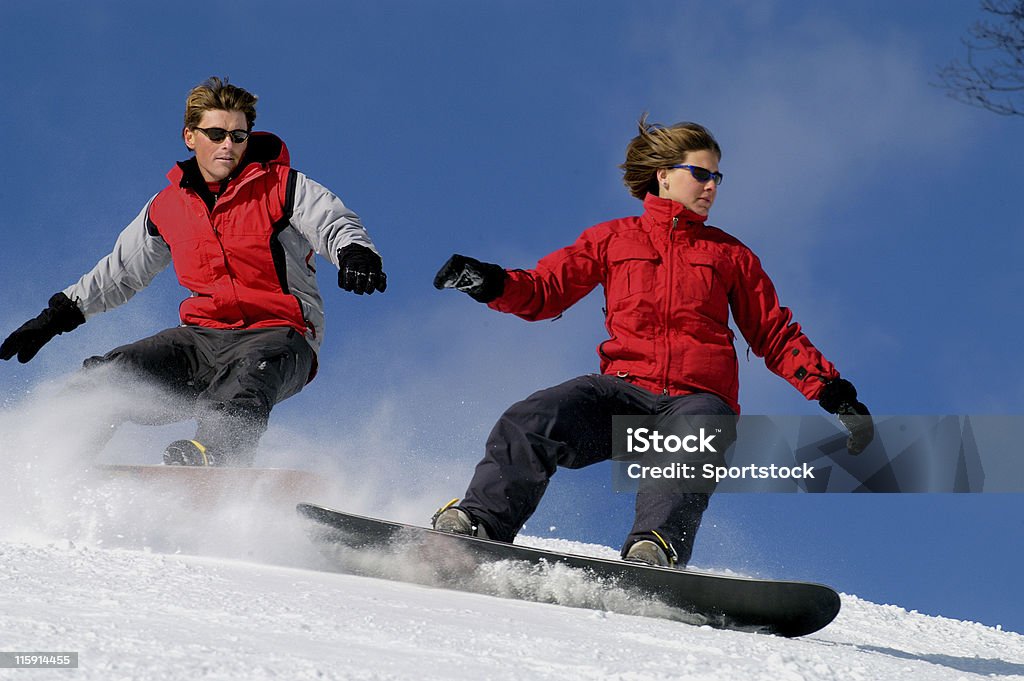 Homme et Femme de snowboard - Photo de Activité libre de droits