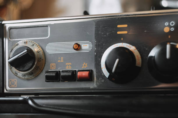 istock Old Gas Kitchen Stove With Dials And Buttons 1159145013