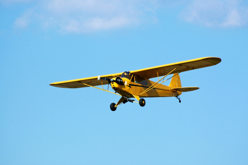 Little yellow airplane. Piper Cub.