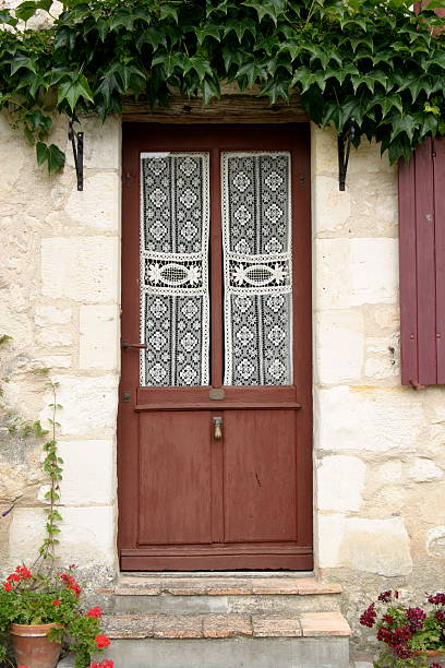 istock door with lace curtain 115914853