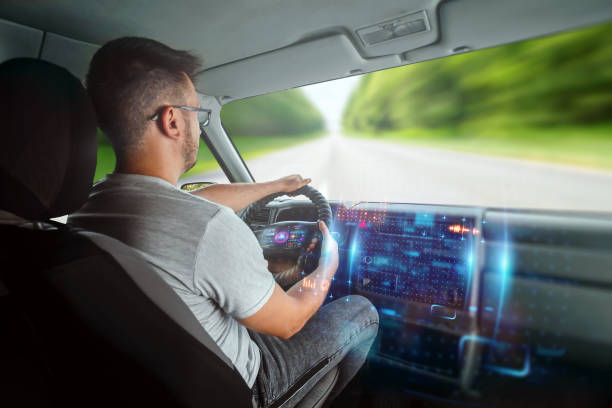 istock A man in an autonomous car. Self-driving. Concept autopilot, automotive engineering, artificial intelligence 1159148871