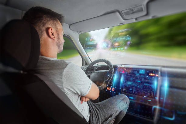 istock A man in an autonomous car. Self-driving. Concept autopilot, automotive engineering, artificial intelligence 1159148875