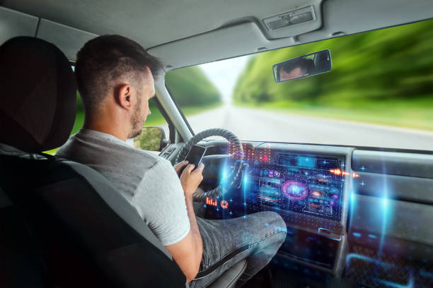 istock A man in an autonomous car. Self-driving. Concept autopilot, automotive engineering, artificial intelligence 1159148894