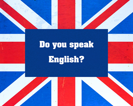 Do you speak English The inscription on the background of the flag of Britain. Concept for school, English language courses. Background, education.