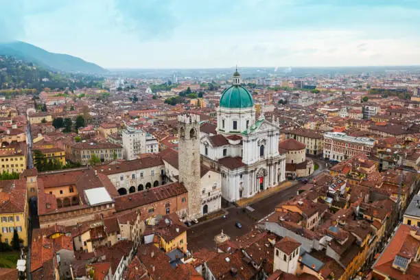 New Cathedral or Duomo Nuovo and Old Cathedral or Duomo Vecchio aerial panoramic view in Brescia city in north Italy