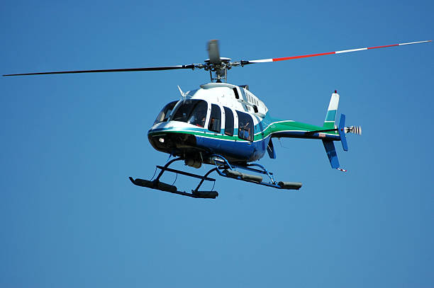 Four rotor, seven passenger helicopter. This helicopter model is also used as an air ambulance. Bell 407.