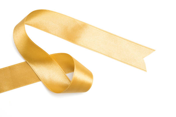 istock Gold ribbon in roll on white background 1159152630