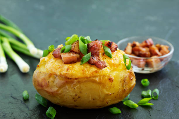 istock Stuffed baked potatoes with cheese and bacon. 1159156568