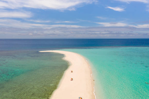 istock Sand beach island on a coral reef, top view 1159158111