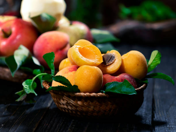 istock Summer fruit on the wooden table 1159158281