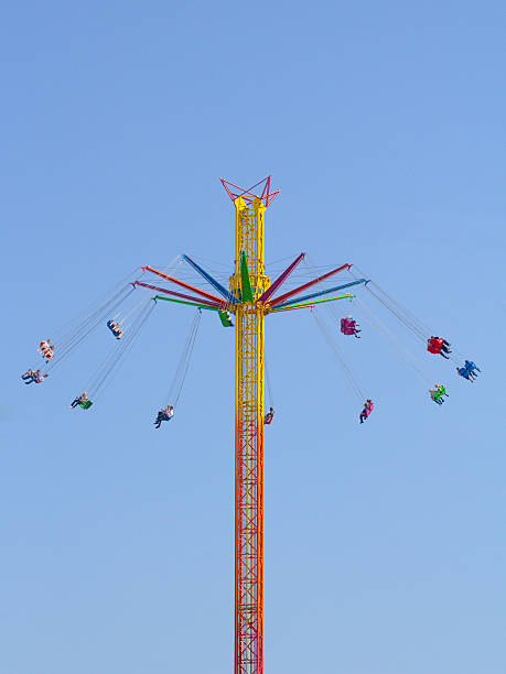 высокий полет - carnival amusement park swing traditional festival стоковые фото и изображения