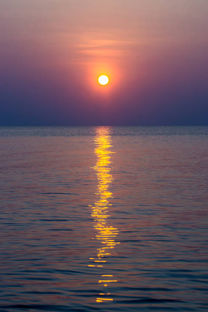 istock Sunset sky on the lake in violet color. 1159163857