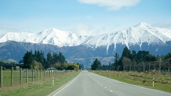 Snow capped Mountains next to the highway in Arthur’s Pass National Park, New Zealand.