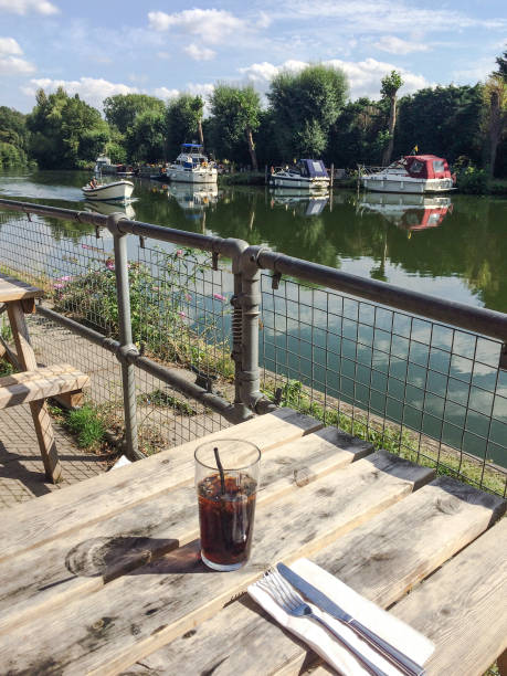 istock Scenic UK riverside view with boats 1159167414