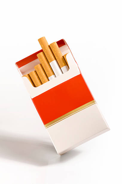 Cigarette packet on white  cigarette photos stock pictures, royalty-free photos & images