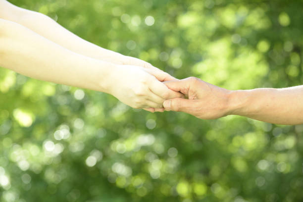 istock Image of care with hand close-up 1159170888
