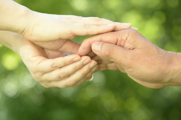 istock Image of care with hand close-up 1159170890