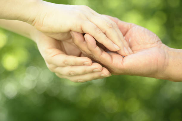 istock Image of care with hand close-up 1159170892